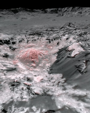 Mozaika snímků ze sondy Dawn v nepravých barvách. Nedávno na povrch dopravený solný roztok se zde jeví načervenalý.